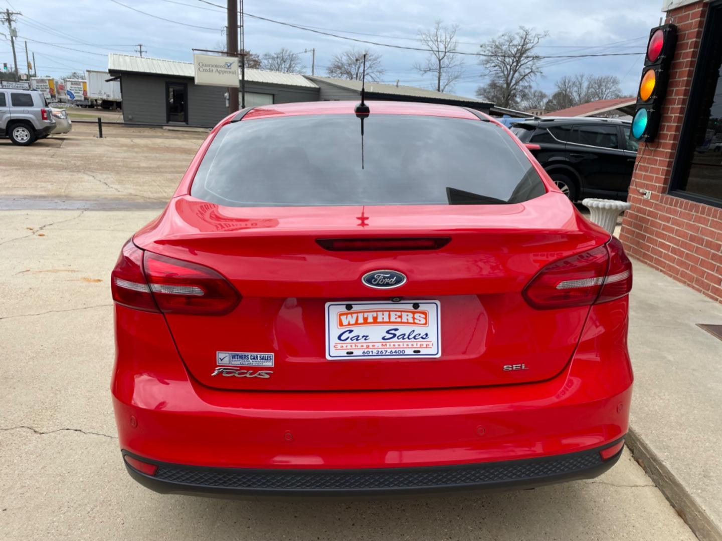 2017 RED /BLACK Ford Focus (1FADP3H29HL) with an 2.0L engine, AUTO transmission, located at 204 Hwy. 16 East, Carthage, MS, 39051, (601) 267-7277, 0.000000, 0.000000 - Photo#3